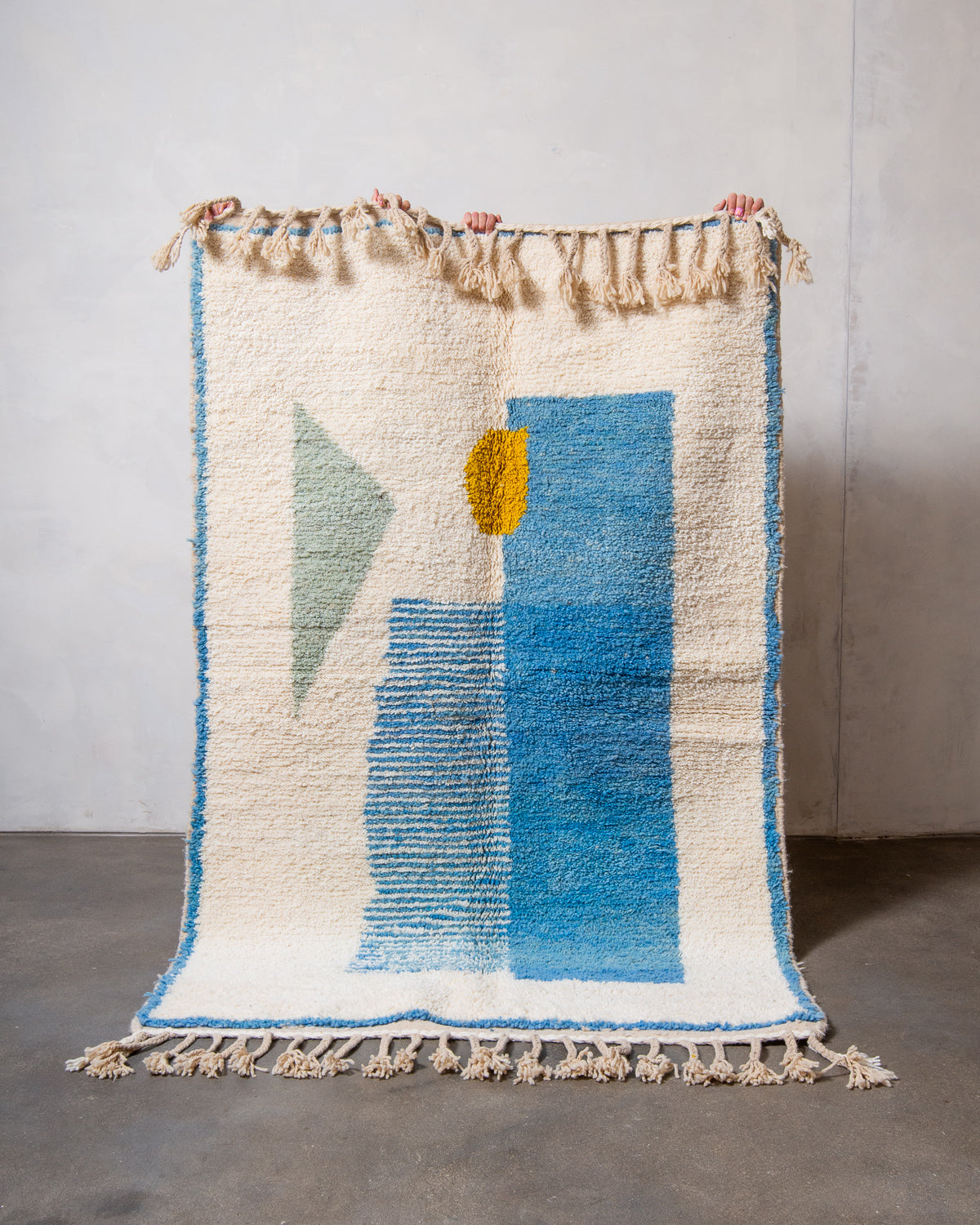 Modern, designer, handcrafted Berber rug from Morocco. Beniourain carpet with beautiful colours and patterns and fluffy wool texture.